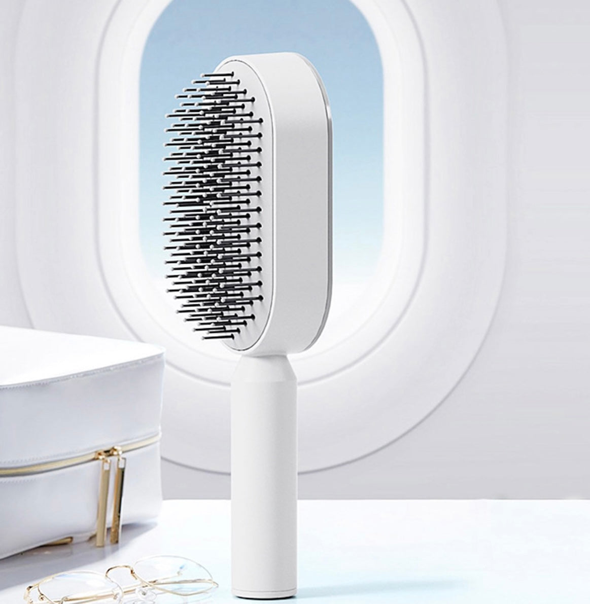 The Deluxe™ Self Cleaning Hair Brush